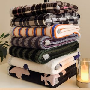Wholesale multifunctional magic cape blanket/air-conditioning throw featuring all-over high-temperature printing; customizable lamb-fleece shawl blanket.